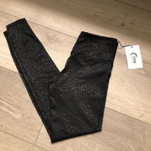 Zyia black leopard light and tight hi- rise size 4